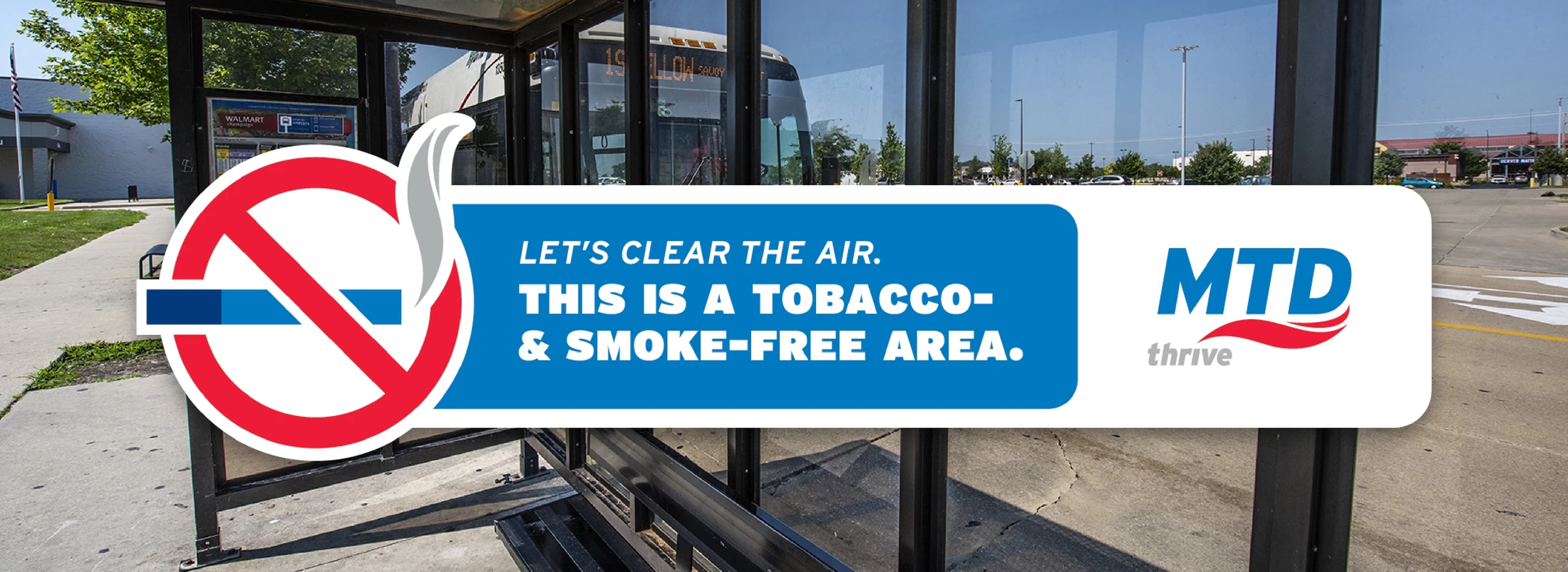 A sign that says let's clear the air tobacco is a no-smoking area.