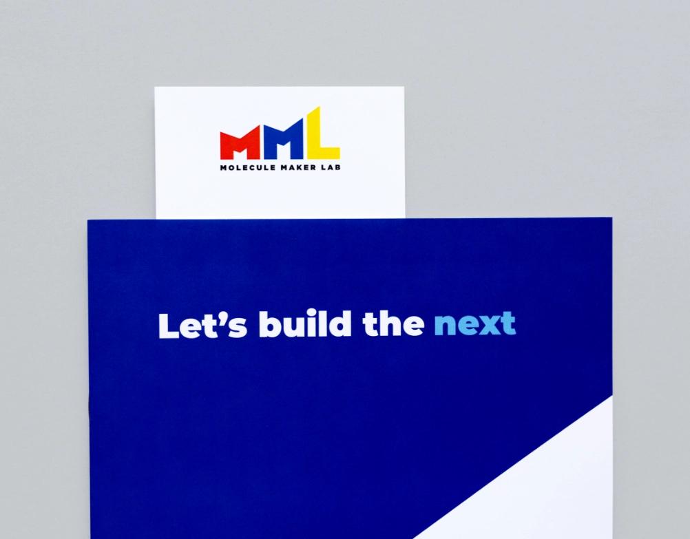 An image of of a branded folder with a notecard sticking out.