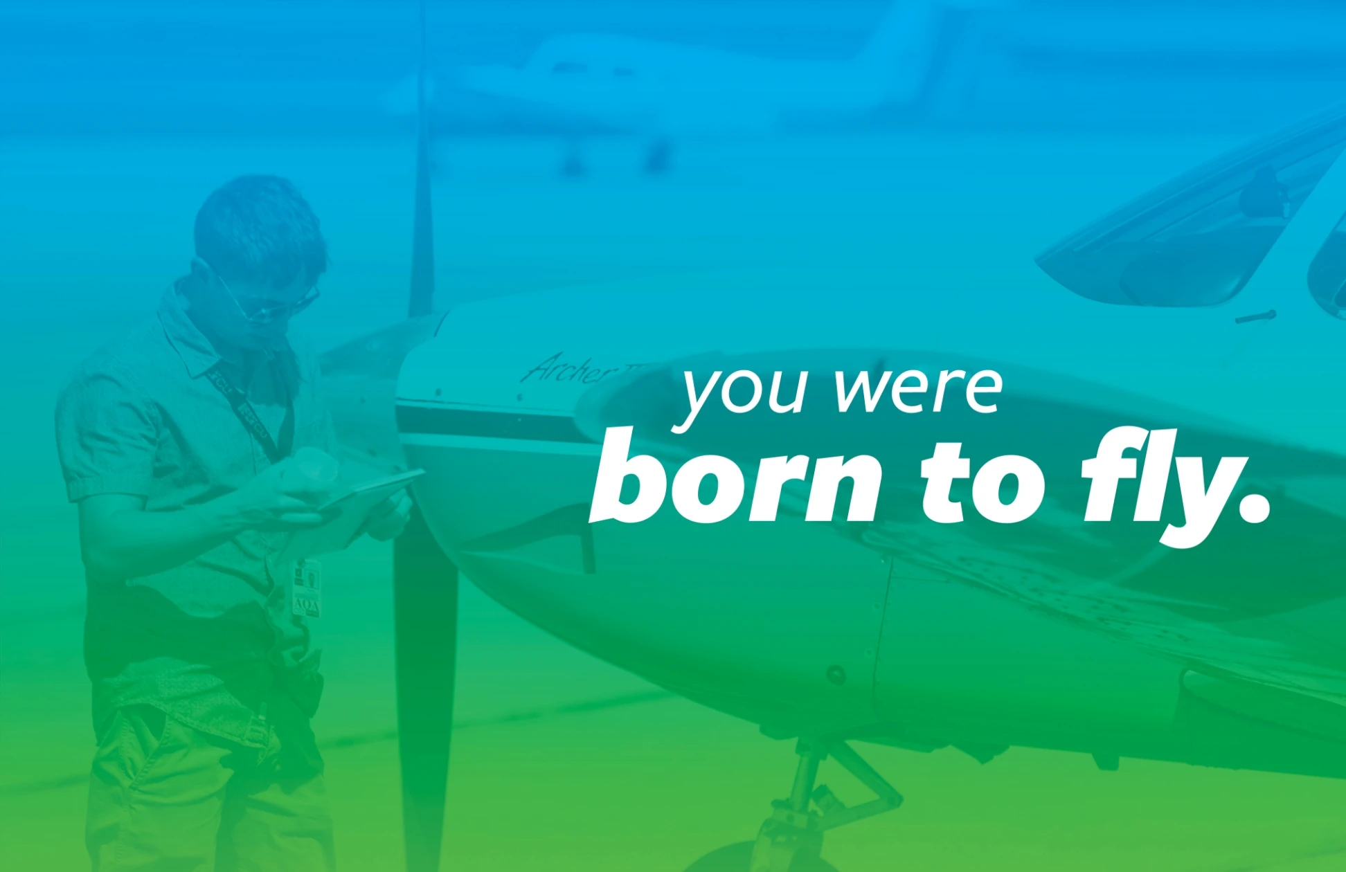 A photo with the slogan, 'born to fly' on it.