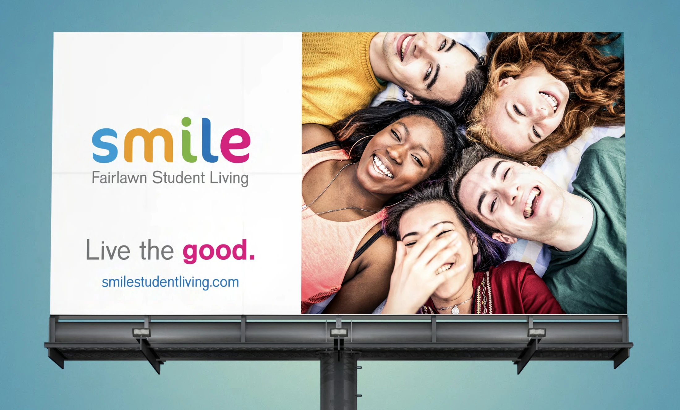 A billboard with the word smile on it.