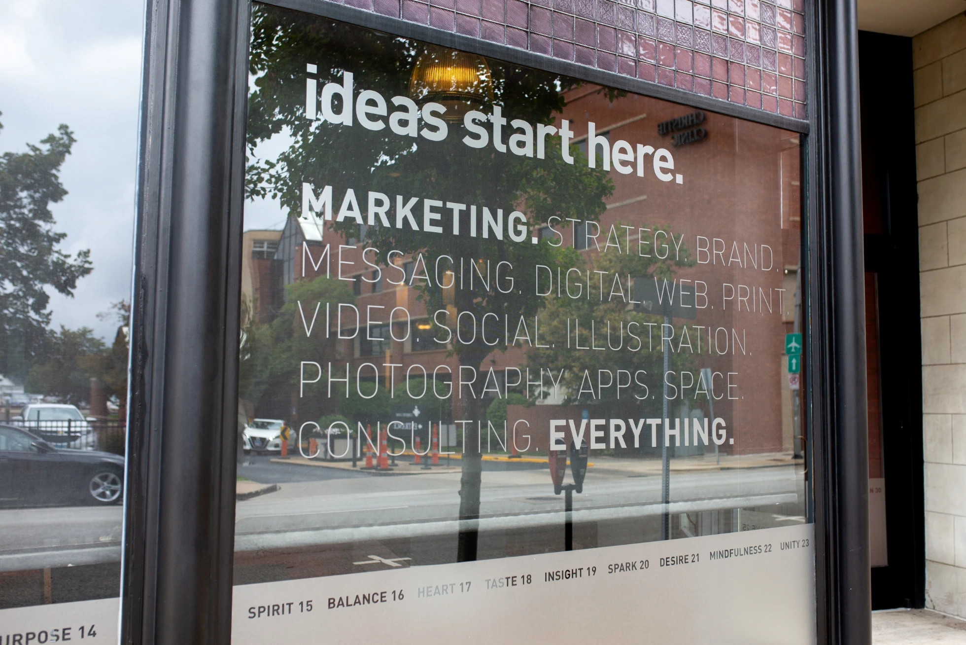 A storefront with a sign that says ideas start here.