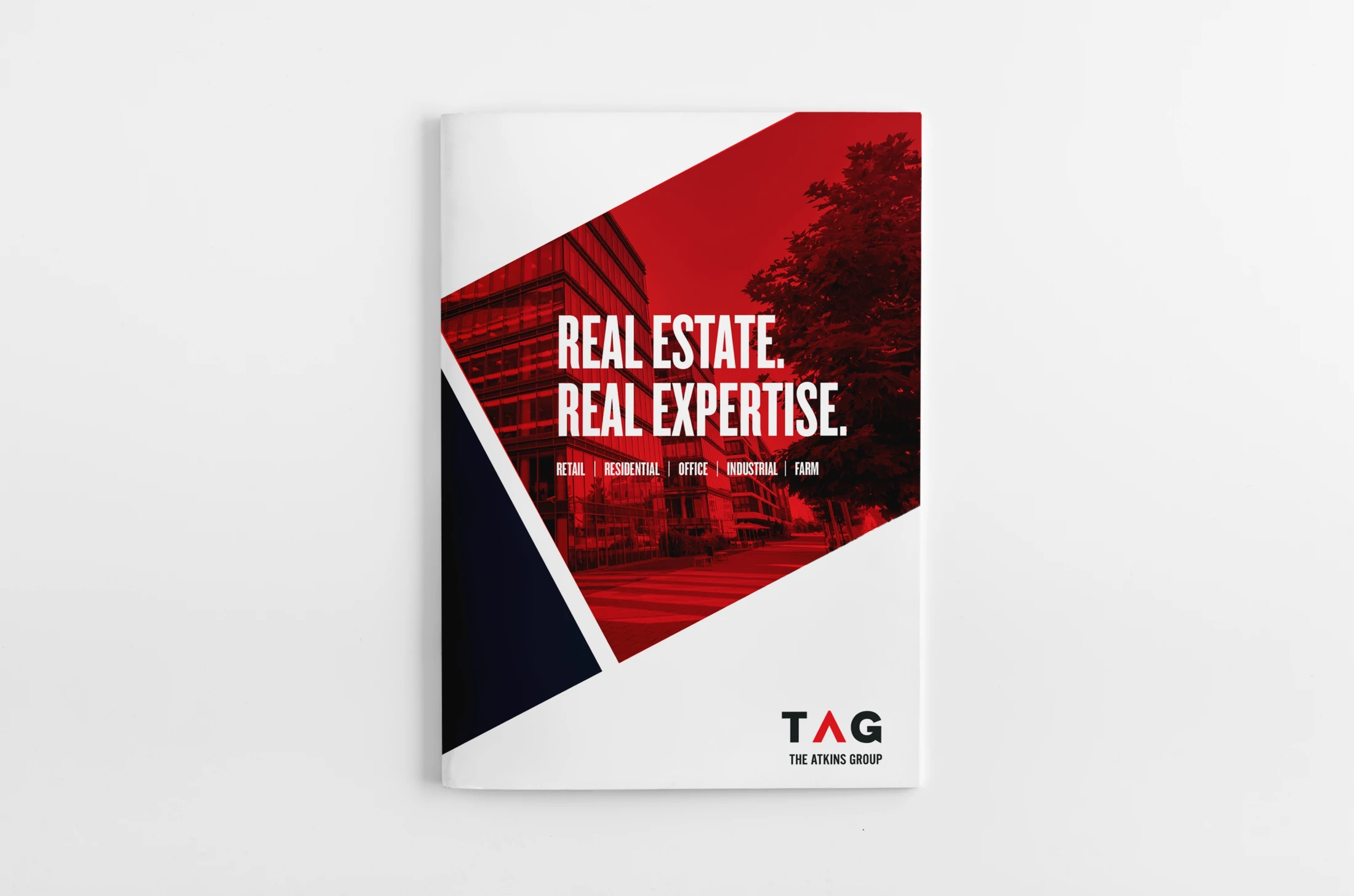 A real estate brochure with a red and black design.