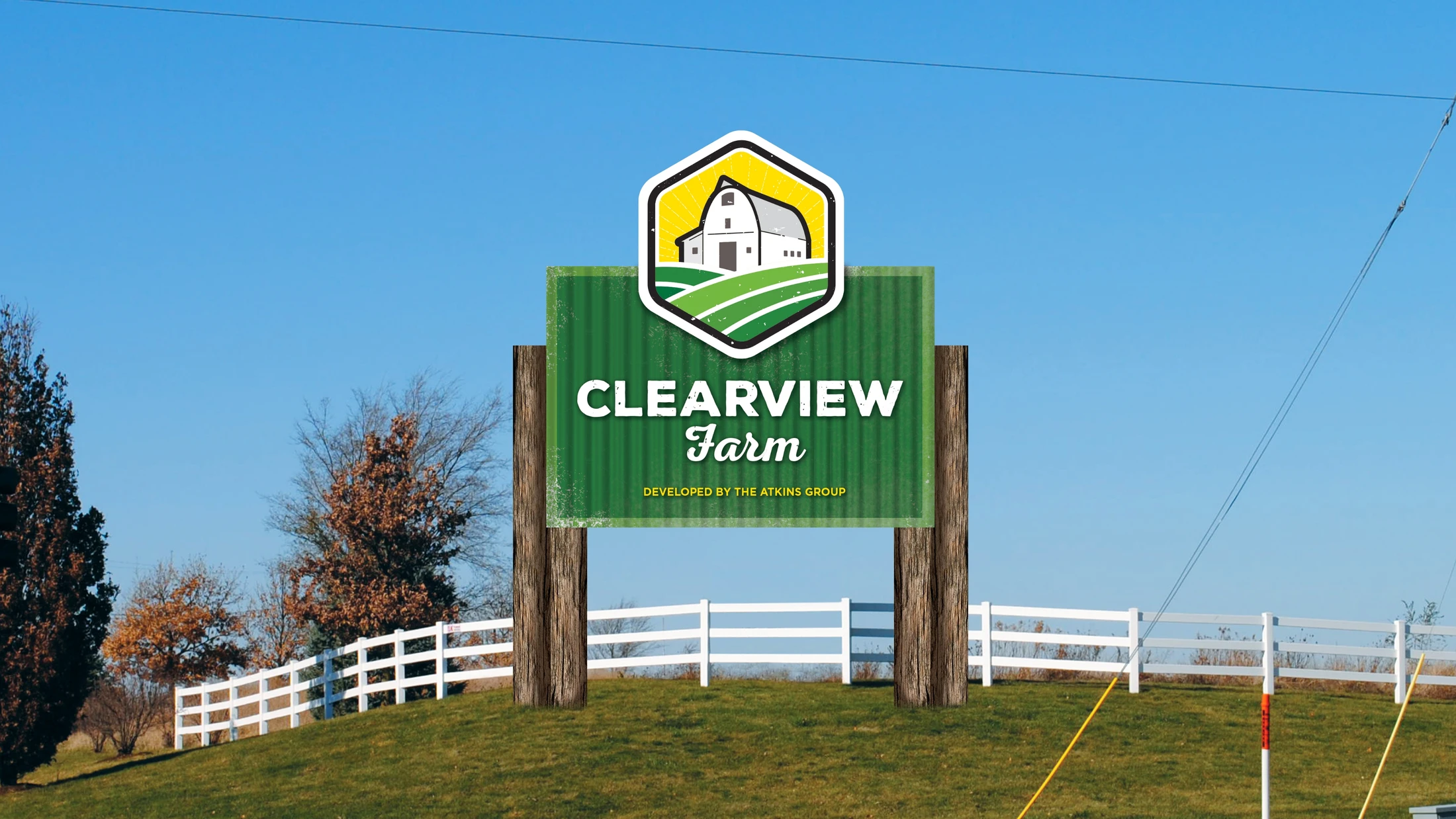 A sign for clearview resort in front of a fence.