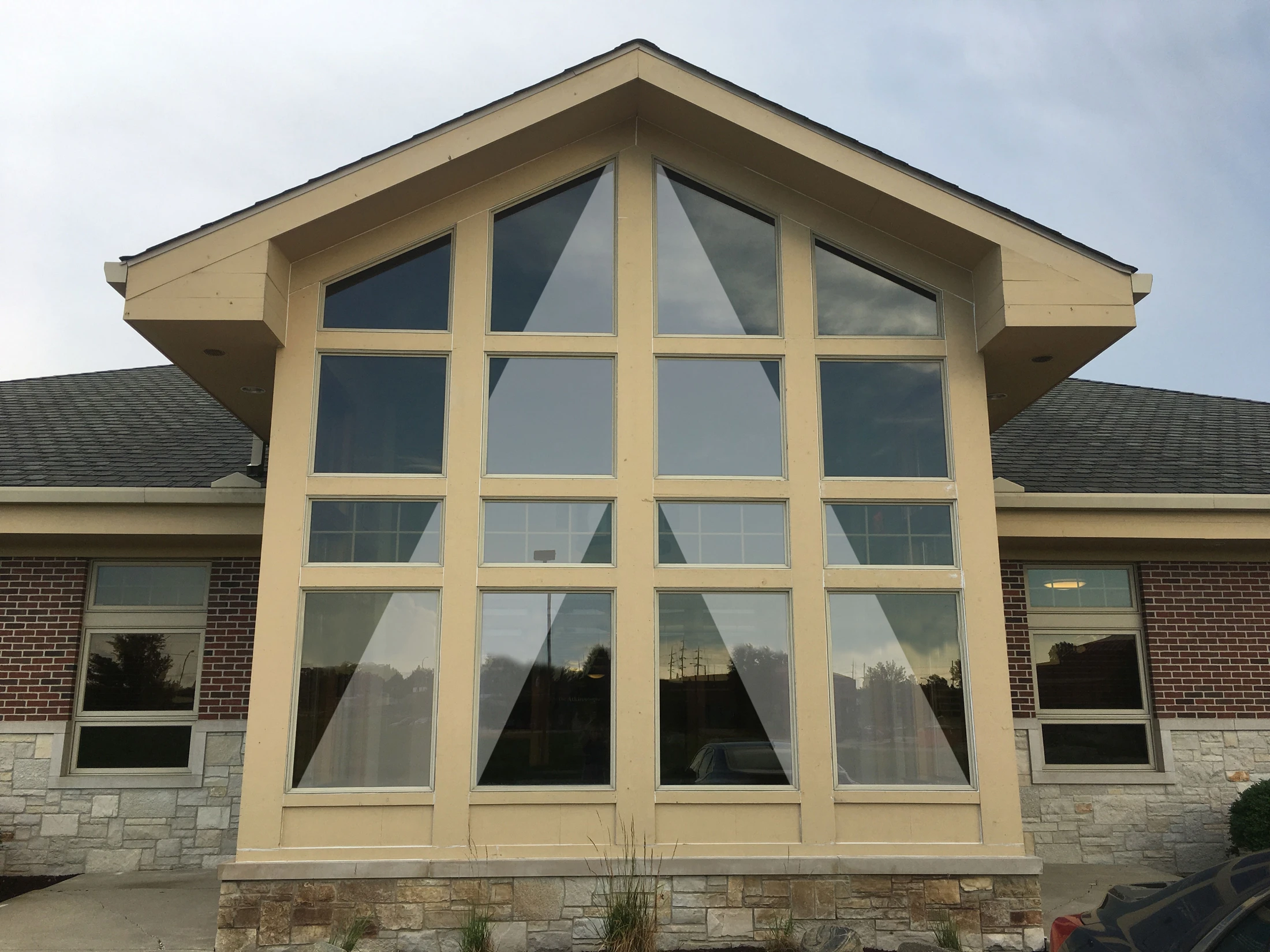 A building with a large window in the front.