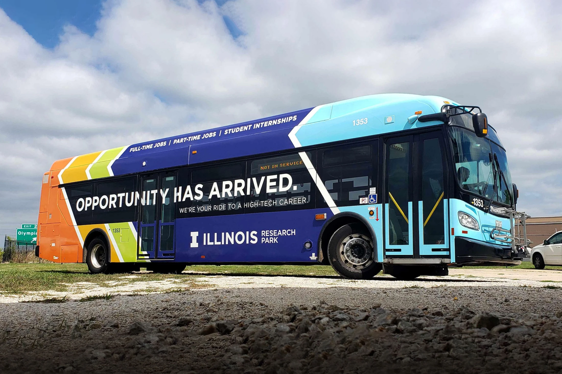 A colorful bus with the words opportunity has arrived.